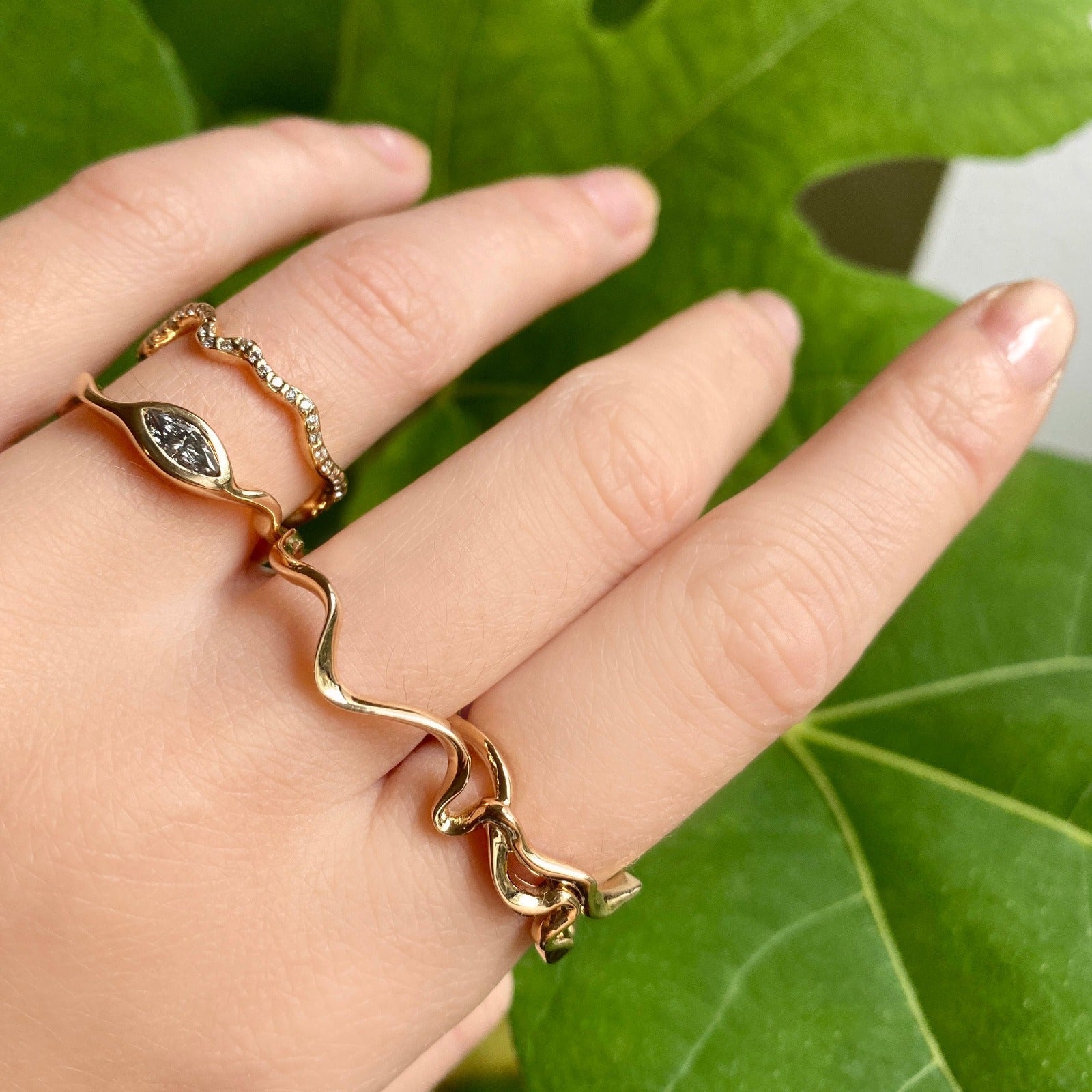 14k gold Double Finger Ripple Ring styled on a hand