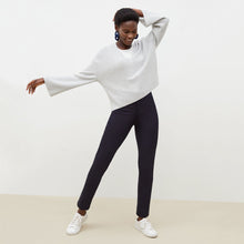 Front image of a woman standing wearing the Hockley pant in ink 