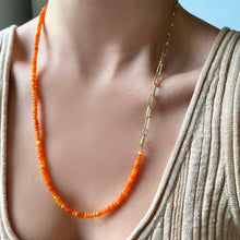 14k gold Chunky Paperclip Chain Bracelet with a lobster clasp on neck attached to a beaded opal necklace