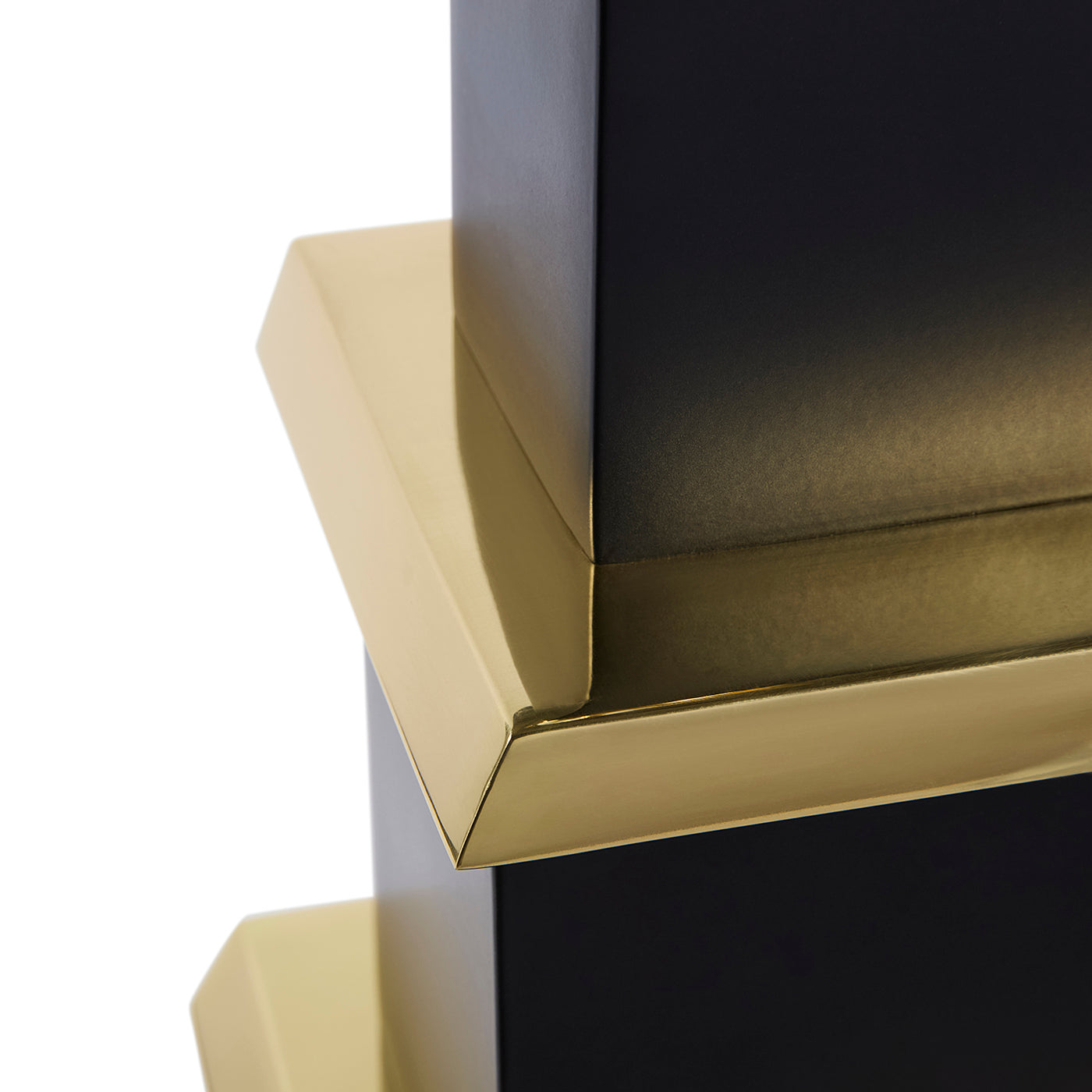 Close-up of a corner with gold trim on a white background