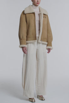 Model is Wearing the Nour Hammour Portia Modern Shearling Aviator Jacket Biscuit - Video