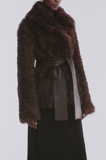 Model is wearing the Nour Hammour Noa Curled Shearling Coat Bourbon - Video