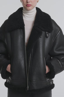 Model is Wearing the Nour Hammour Portia Modern Shearling AviatorJacket Black - Video Close-Up