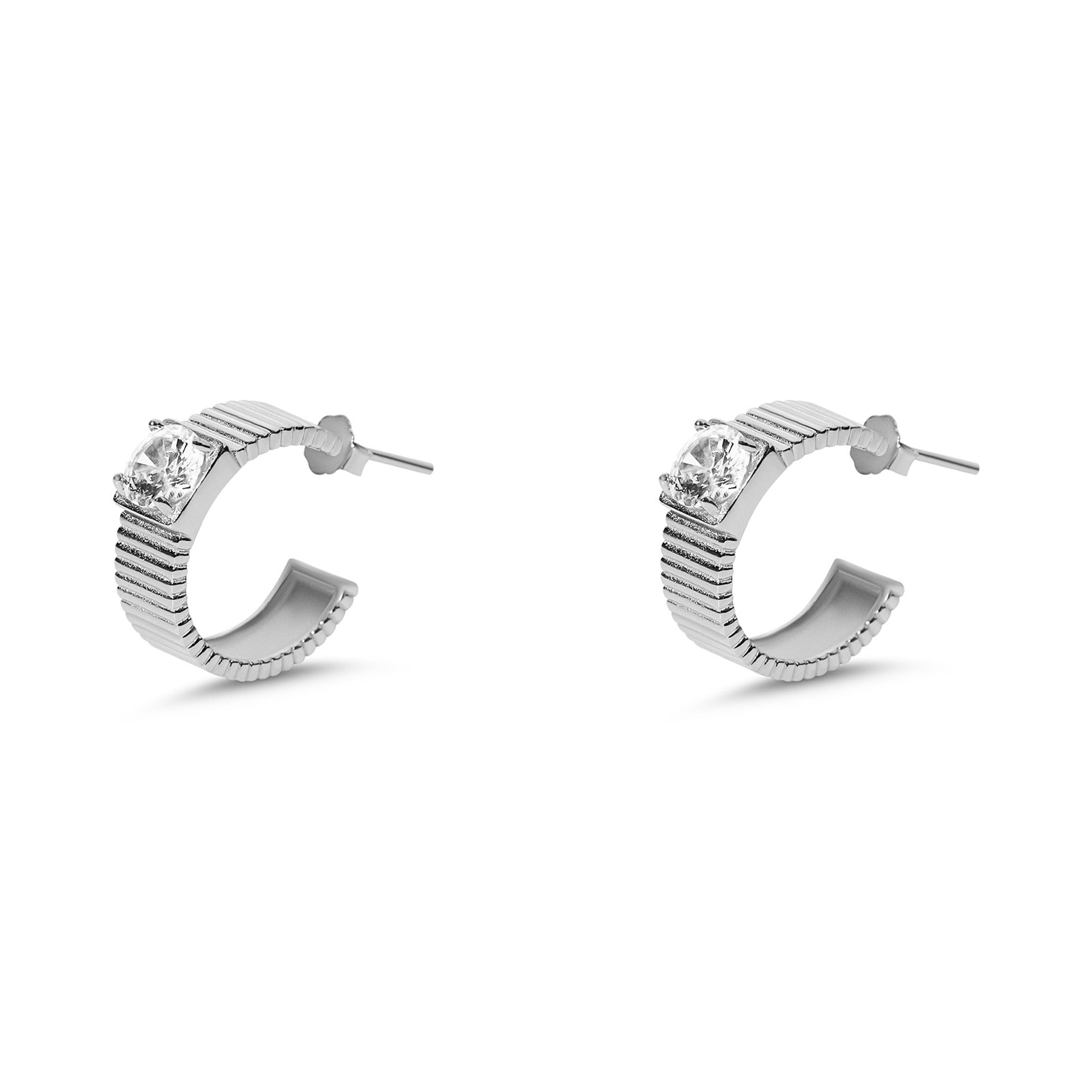 cz huggie earrings with silver finish