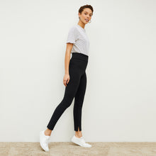 Side image of a woman standing wearing the stella legging in black | Lead